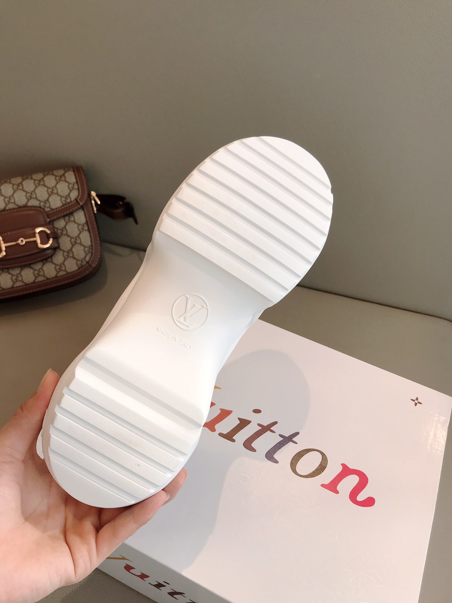 l**is V*t*n archlight sneaker